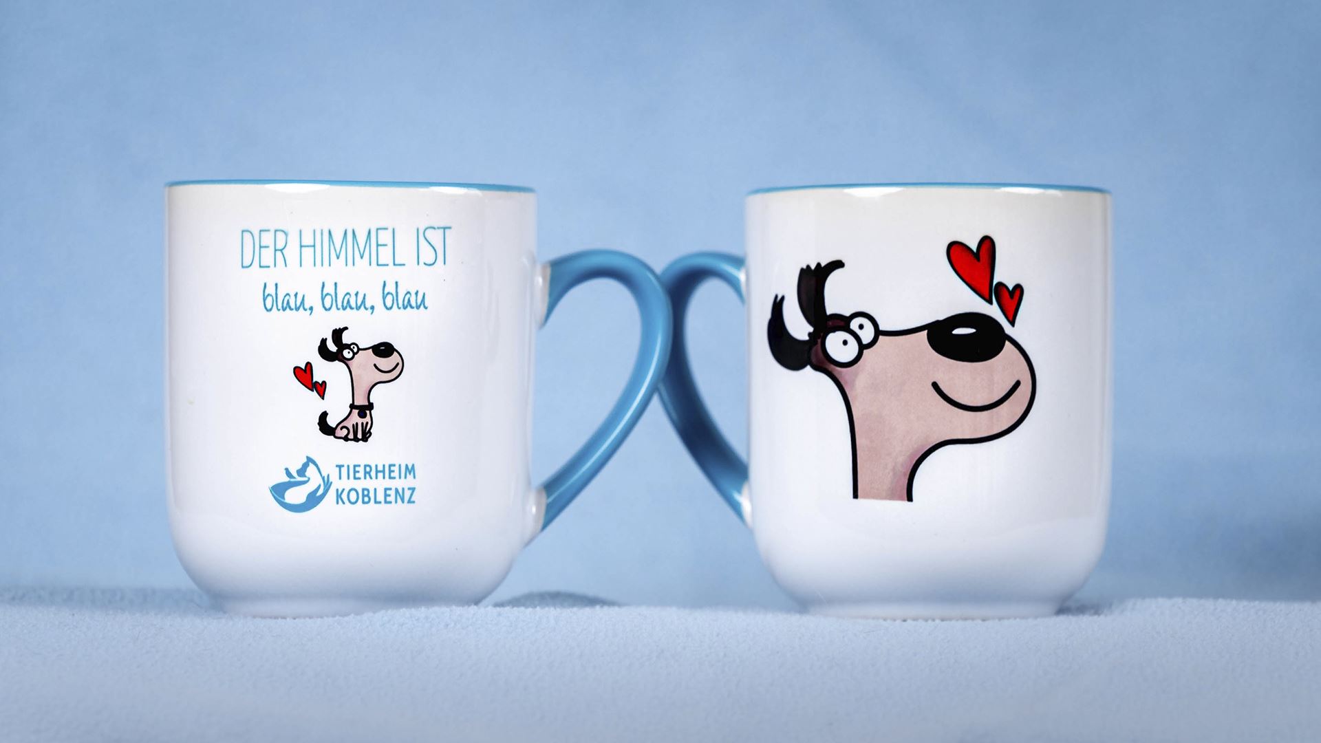 2 Tassen mit Hundemotiv